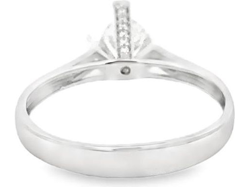 18K White Gold Ring with Natural Round Diamond and Accent Diamonds in Star Setting