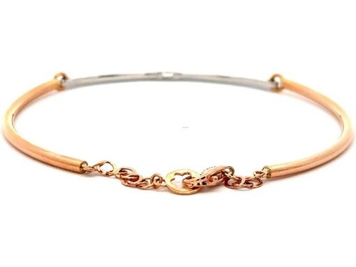 18K White and Rose Gold Bangle Bracelet with a Natural Baguette Diamond Center and Round Diamonds on Both Sides