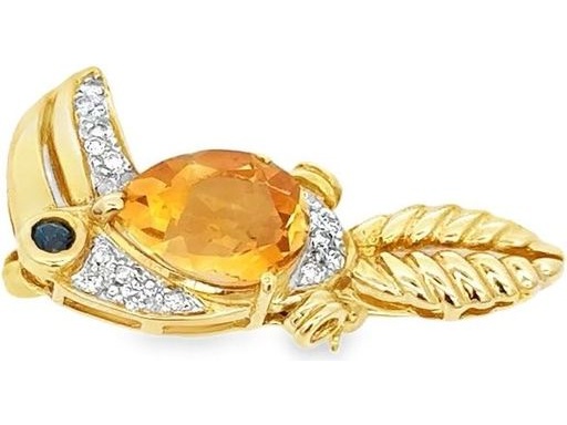 Toucan motif brooch in 18k yellow gold ,featuring a pear  yellow citrin,saphire and diamond accents